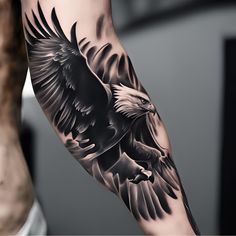 an eagle tattoo is shown on the arm