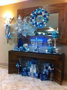 a hanukkah menorah display with blue decorations