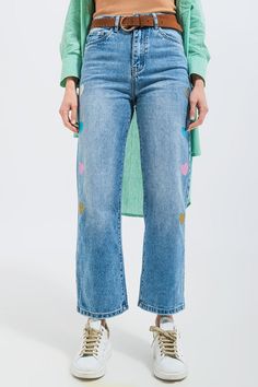 Reminiscent of the 1990s, these adorable mom jeans boast of eye-catching glitter hearts that cascade down the side of the legs. They are high-waisted, with straight legs, five pockets, a zip fastening, and belt loops. The belt in the photos is not included. The rigid, non-stretch denim fabric is made from 100% Cotton. In our photos, we pair these jeans with our Rib Crop Top in Beige and our Cotton Oversized Shirt in Green. The model is 5’8” with measurements of 33-24-35 and is wearing a size sma Types Of Jeans, Stretch Denim Fabric, 90s Looks, Ribbed Crop Top, Blue China, Girls Denim, Knitwear Tops, Oversized Shirt, Heart Print