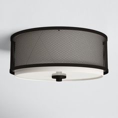 a black and white ceiling light with mesh shades