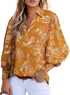 PRICES MAY VARY. V-Neck with Top Button: This 2024 women's balloon sleeves blouse features a V-neck design with a single top button, The only button is at the collar, and the rest of the blouse is stitched closed. The material of the blouse feels silky against the skin. The lantern sleeve detail on this women's shirt adds a fashionable statement.The elastic smocked wrist is comfortable,snug and stretchy for setting a different sleeve length.The sleeves are really nice when you wear them as long Balloon Sleeves Blouse, V Neck Shirts, Oversized Button Down Shirt, Lantern Sleeved Blouses, Shirts Long Sleeve, Trendy Blouses, Women Blouse, Blouse Tops, Tunic Styles