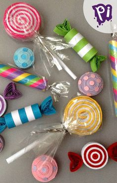 lollipops and candy are laid out on the table