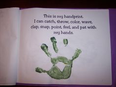 an open children's book with handprints on the pages and words written in green