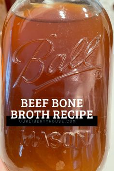 a mason jar filled with beef bone broth