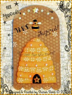 a card with a beehive and stars on it