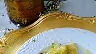 a white plate topped with food on top of a table