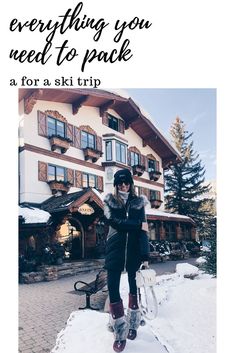 a woman standing in front of a building with the words everything you need to pack for a ski trip