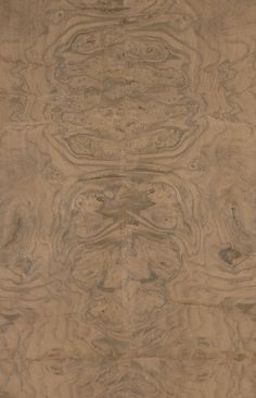 an image of wood textured with natural patterns on it's surface in brown tones