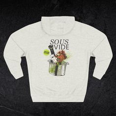 This premium feel, mid-weight hooded sweatshirt features a unique illustration of the Sous Vide culinary technique. The graphic on the garment's back showcases the sous vide method--in which food is vacuum-sealed and cooked slowly in a water bath at a precise, consistent temperature. This method enhances flavor and texture, ensuring perfectly cooked dishes every time. Whether you're a professional chef or a passionate home cook, this design celebrates the craft of sous vide cooking. The front of the hoodie displays the Knife Shift's logo, a mark of quality for culinary enthusiasts. This versatile hoodie is perfect for casual wear or kitchen adventures, making it a great gift for chefs and gift for foodies alike. Rep your passion for cooking with this standout piece. -About the Hoodie- Prem Gift Ideas For Foodies, Creme Brulee Desserts, Gifts For Chefs, Food Map, Culinary Techniques, Food Shirt, Unique Illustration, Sous Vide Cooking, Sweet Heat