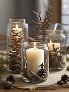 Christmas Decor Ideas Jars, Candle Jars Christmas, Pinecone Christmas Centerpiece, Pinecone Vase Centerpiece, Pine Cones In Glass Vase, Christmas Decor Ideas Woodland, Glass Jar Candle Holders Diy, Natural Christmas Centerpieces, Natural Christmas Aesthetic