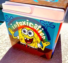 an image of a cooler with cartoon characters on it's side and the words intoxicatini written in large letters