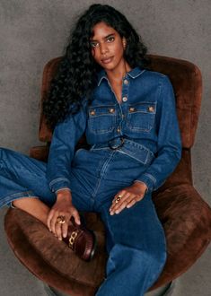 Long-sleeved jumpsuit with open wrists;Front button placket and a zip;Straight leg;Italian front and back patch pockets;Removable belt with buckle;Inside leg length 81 cm / 31.8 in (for a size 36) Retro Denim Jumpsuit, Dark Denim Jumpsuit, Dark Denim Outfit, Worship Outfits, Denim Jumpsuit Outfit, Denim Photoshoot, Jean Fits, Denim Party, Women Wearing Ties