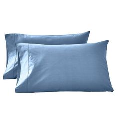 two light blue sheets and pillows on a white background