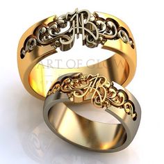 two gold wedding rings with filigrees and hearts on the sides, set against a white background