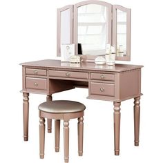 Get ready to start your day with this versatile vanity set. Crafted from solid rubberwood, manufactured wood, and birch veneers, this set includes one vanity table, one three-panel mirror, and one upholstered stool. Five drawers provide a place for brushes, makeup, and more. Turned legs bring out this sets traditional side, while a neutral finish allows it to blend with a variety of color palettes and aesthetics. Assembly is required. Available in Pink Rose Gold Color, Black, White, Silver and C Dressing Room Decor Ideas, Glass Vanity Table, Make Up Vanities, Make Up Drawer, House Necessities, Makeup Vanity With Drawers, Vanity Table Vintage, Makeup Vanity Ideas, Vanity With Drawers