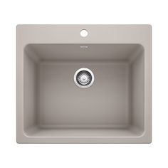 a gray sink with a drain in the middle