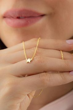 10k 14k 18k Solid Gold Star Necklace, Tiny Diamond Star Necklace, Mini Small Star Drop Necklace, Celestial Dainty Star Necklace Gift for Her  FEATURES• Solid Gold (real gold, not gold plated or gold filled material)• Gold Karat: 10K (417) - 14K (585) - 18K (750) (optional)• Pendant Height: 0.33 Inches (0.84 cm)• Pendant Width: 0.35 Inches (0.89 cm)• Available Gold Color: Yellow gold, rose gold and white gold (optional)• Diamond weight: 0.015 ct• Diamond color: G-H Color• Diamond clarity: SIWhole 14k Gold Dainty Jewelry With Star Charm, Dainty 14k Gold Star Charm Jewelry, Yellow Gold Star-shaped Jewelry With Delicate Chain, Dainty Star-shaped Yellow Gold Jewelry, Dainty Yellow Gold Star Jewelry, Delicate Yellow Gold Star Jewelry, 14k Gold Star Charm Jewelry, Delicate 14k Gold Jewelry With Star Charm, Delicate 14k Gold Star Necklace