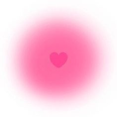 a pink circle with a heart in the center on a white background that appears to be blurry