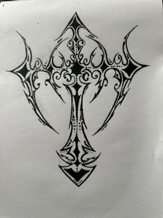 a cross tattoo design on white paper with black and grey ink in the middle,