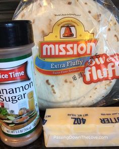 the ingredients to make an enchilada burrito are displayed on a counter