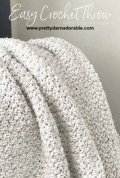 the easy crochet throw is made with yarn