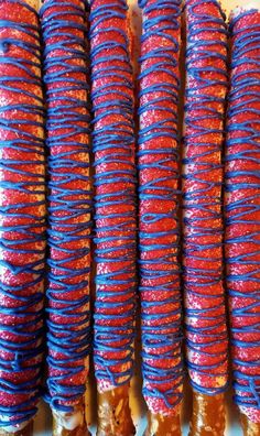 several red, white and blue candy sticks on a plate