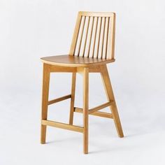 a wooden bar stool on a white background