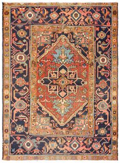 an antique rug with many different colors and patterns on it, including blue, red, orange