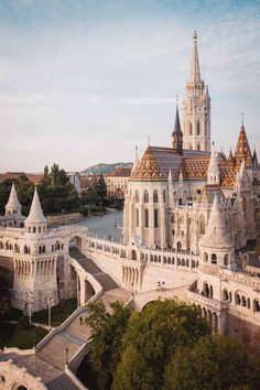 an aerial view of a castle with many spires