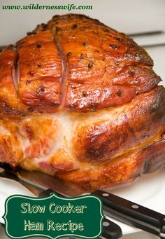 a close up of a cooked ham on a plate