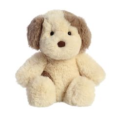 a small stuffed dog sitting up against a white background