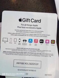 an apple gift card sitting on top of a table