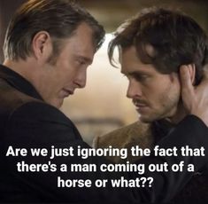 two men facing each other with the caption are we just ignoring the fact that there's a man coming out of a horse or what?