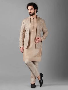 Ready yourself for receptions and special occasions with this modish beige silk Indowestern. The exquisite embroidery and sequins work makes it a showstopper, complete with a bottom. Wedding Guest Indian, Indian Groom Outfit, Indowestern Men, Beige Silk, Indian Groom, Groom Outfit