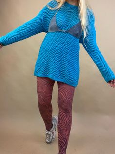 "Bright neon blue open weave pullover long sweater. Cotton/ramie blend. Longer silhouette, with drop shoulders. Possibly 90's- Y2K.  Sizing: Marked a s/ modern l, and fits xs-l best. 46\" around, 27\" drop shoulders, 19\" arms, 31\" length.  All vintage items are hand picked for its uniqueness and are one of a kind. The condition is great unless otherwise noted. Because vintage sizing differs from modern sizing, I put the modern equivalent and dimensions. Because these items are older and may be pre-loved, flaws, fading and wear can naturally come with time. We do our absolute best to describe flaws, and hope you understand and appreciate the uniqueness and story behind each piece as much as we do. They all come from a smoke and odor free home. We ship in 1-2 days, but generally same day. Chunky Loafer, Grunge Boots, Sweater Cotton, Long Sweater, Open Weave, Cotton Crochet, Neon Blue, Blue Ties, Blue Tie Dye