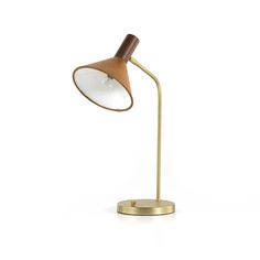 a brass and wood desk lamp on a white background