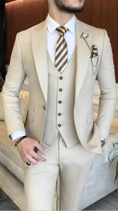 Collection: BespokeDaily Spring – Summer 2022  Product: Slim-Fit 3 Piece Suit  Color Code: Beige  Size: EU46/US36 S | EU48/US38 S | EU50/US40 S | EU52/US42 S | EU54/US44 S | EU56/US46 S | EU58/US48 S  Suit Material: 49% polyester, 49% Viscose, 2% Elestan  Drop: 8  Cutting: Italian  Button: One Button  Vents: Double Vent  Machine Washable: No  Fitting: Slim-fit  Package Include: Jacket, Vest and Pants Beige Mens Suit, 3 Piece Suit For Men, Coat Pant For Men, Italian Style Suit, Pant Top, Groom Dress Men, Classy Suits