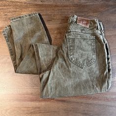 "Vintage 1990s Riveted Lee Jeans High Waisted  Military Green Color Jeans Tapered Legs Relaxed Fit Wear Consistent With Age Size 4 Measurements: (Flat Across) Natural Waist: 13\" Rise: 11\" Hips: 20\" Thighs: 12\" Leg Openings: 5.5\" Inseam: 32\" Waist to Hem: 42\" Made in USA" Color Jeans, White Jean Shorts, Vintage Levis Jeans, Jeans High Waisted, Vintage Wrangler, Lee Jeans, Wrangler Jeans, Distressed Black Jeans, Womens Jeans