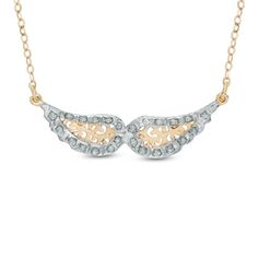 Treat your special angel to her own set of sparkling wings in this Diamond Fascination™ necklace. Fashioned in 14K gold, this necklace features a pair of diminutive diamond-cut wings are outlined with a frame that features one diamond accent and beautiful diamond enamel beading. Polished to a brilliant shine, the design suspends centered along a 17.0-inch cable chain that secures with a lobster claw clasp. Diamond Fascination™ is a patented handmade process which crystallizes diamond dust into e Wings Necklace, Diamond Dust, Wing Necklace, Fine Jewellery Necklace, Diamond Stone, Round Cut Diamond, Necklace Designs, Cable Chain, Lobster Claw