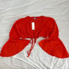 Urban Outfitters Self-Tie Crop Top Size Medium Condition: Nwt Color: Red Details : - Bell Sleeves - Front Tie In Front - Perfect On Your Own Or With A Tank Or Bralette Under Extras: - I Ship Between 1-2 Days Summer V-neck Tied Tops, Trendy Spring Top With Tied Details, Trendy Tied Tops For Spring, Trendy Summer Tops With Tie Waist, Trendy Tie Waist Top For Summer, Beach Fitted Tops With Tie Waist, Fitted Beach Tops With Tie Waist, Fitted Tie Waist Beach Tops, Casual Tied Top For Brunch