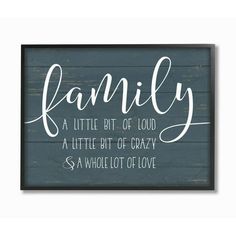 a wooden sign with the words family written in cursive writing, on it