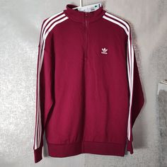 The Top Is Brand New. Size: S Material: Cotton, Spandex, Polyester Pit To Pit: Approx 22" Length: Approx 29" Color: Burgundy Rita Ora Adidas, Adidas Cropped Hoodie, Varsity Sweatshirt, Mock Neck Sweatshirt, Adidas Zip Up, Adidas Crop, Red Pullover, Striped Sweatshirts, Adidas Originals Women