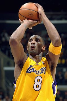 a basketball player is about to dunk the ball