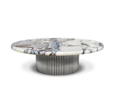 a round marble table with metal base on an isolated white background, viewed from the front