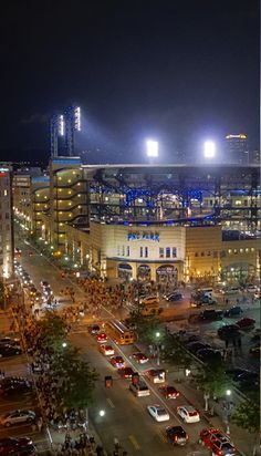 an aerial view of a city at night with the words discovery pnc park on it