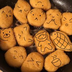 some kind of fried food with faces drawn on it