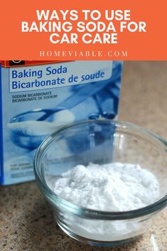 a glass bowl filled with baking soda next to a packet of baking soda cleaning hacks