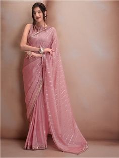 Pink and silver-toned sareeStriped embroidered saree with embroidered border borderHas sequinned detailThe saree comes with an unstitched blouse pieceThe blouse worn by the model might be for modelling purpose only. Check the image of the blouse piece to understand how the actual blouse piece looks like. Light Pink Saree Look Traditional, Georgette Designer Sarees, Baby Pink Saree Look, Onion Pink Saree Combination, Pink Saree For Farewell, Blouse For Pink Saree, Pink And Silver Saree, Pink Saree Outfit, Blouse Designs For Organza Sarees