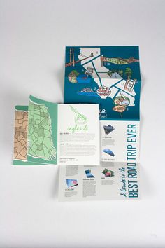 the brochure is open to show maps and information