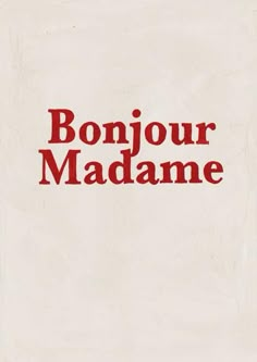 the words bonjou madame are written in red on a white background with a black border